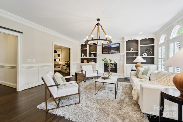 7812 Seton House Ln, Charlotte, NC 28277 - living area with wood finished floors, a chandelier, ornamental molding, wainscoting, and built in shelves