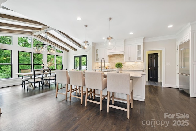 7812 Seton House Ln, Charlotte, NC 28277 - dining room featuring plenty of natural light, dark wood-style flooring, recessed lighting, and baseboards