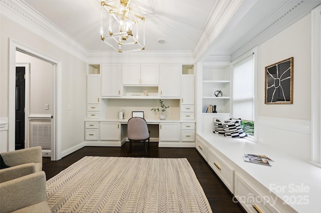 7812 Seton House Ln, Charlotte, NC 28277 - office area with built in study area, ornamental molding, a chandelier, and dark wood finished floors