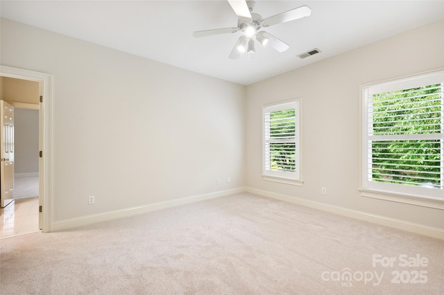 7812 Seton House Ln, Charlotte, NC 28277 - unfurnished room with light carpet, baseboards, and ceiling fan