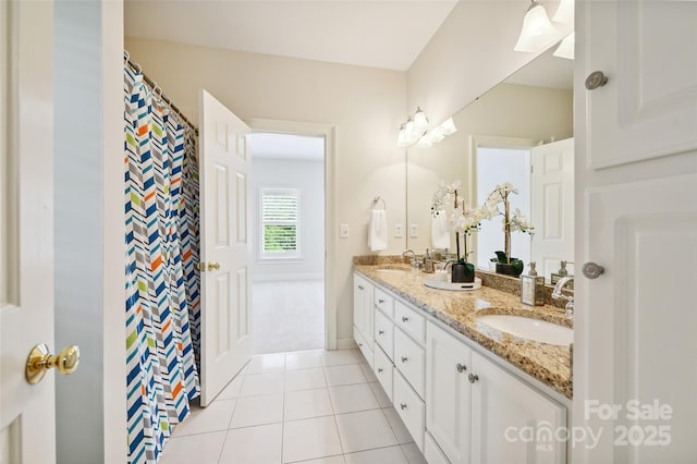 7812 Seton House Ln, Charlotte, NC 28277 - full bathroom featuring double vanity, tile patterned floors, and baseboards