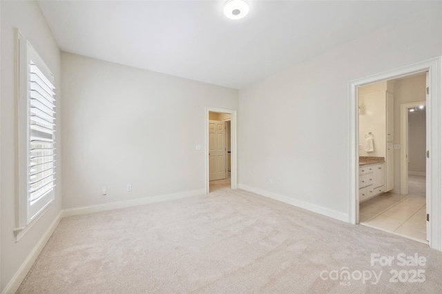 7812 Seton House Ln, Charlotte, NC 28277 - unfurnished bedroom with light carpet, multiple windows, and baseboards