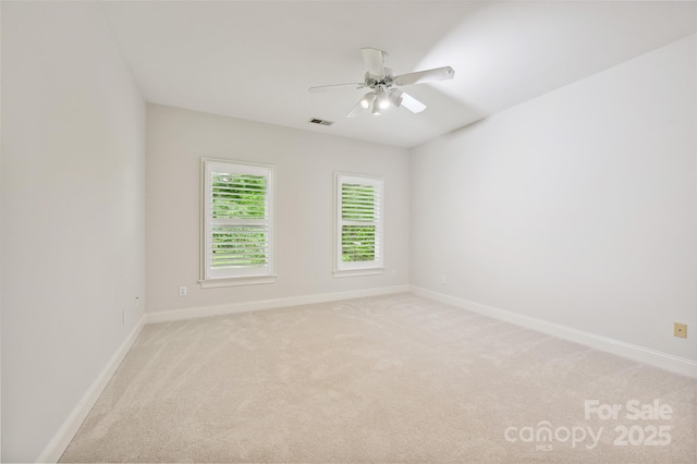 7812 Seton House Ln, Charlotte, NC 28277 - empty room featuring light colored carpet, baseboards, and a ceiling fan