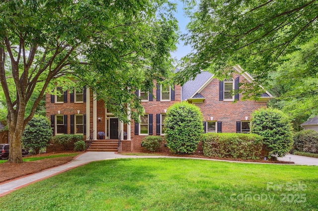7812 Seton House Ln, Charlotte, NC 28277 - view of front of property with a front lawn and brick siding