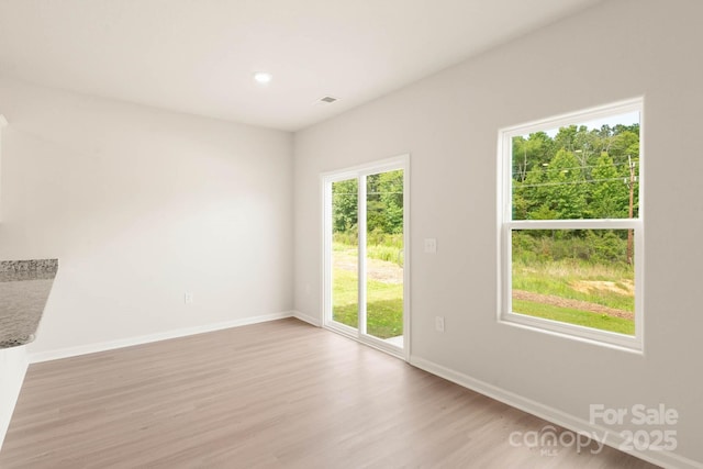 3342 Strong Box Ln, Gastonia, NC 28052 - spare room featuring light wood finished floors, baseboards, and recessed lighting
