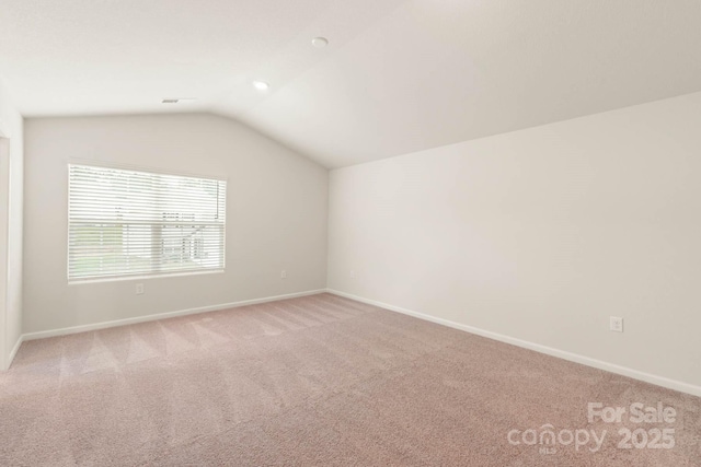3342 Strong Box Ln, Gastonia, NC 28052 - bonus room featuring light carpet, lofted ceiling, and baseboards