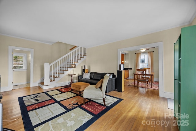 45 Woodvale Ave, Asheville, NC 28804 - living area with stairs, light wood finished floors, plenty of natural light, crown molding, and baseboards