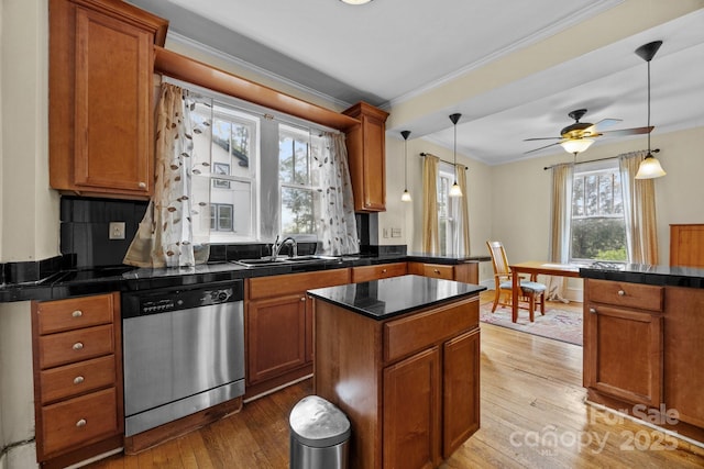 45 Woodvale Ave, Asheville, NC 28804 - kitchen featuring dishwasher, a sink, ornamental molding, brown cabinets, and light wood-style floors