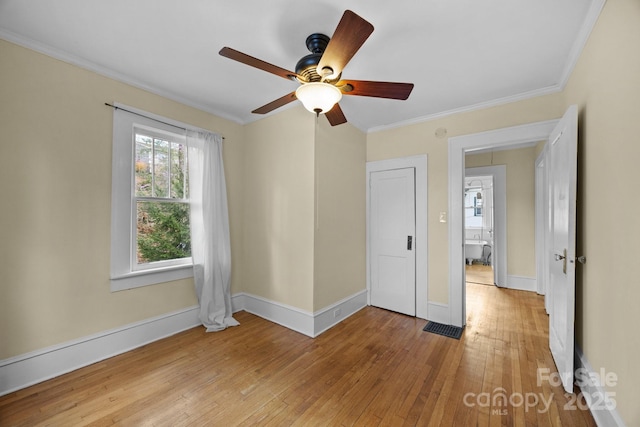 45 Woodvale Ave, Asheville, NC 28804 - unfurnished room featuring ornamental molding, light wood-type flooring, ceiling fan, and baseboards