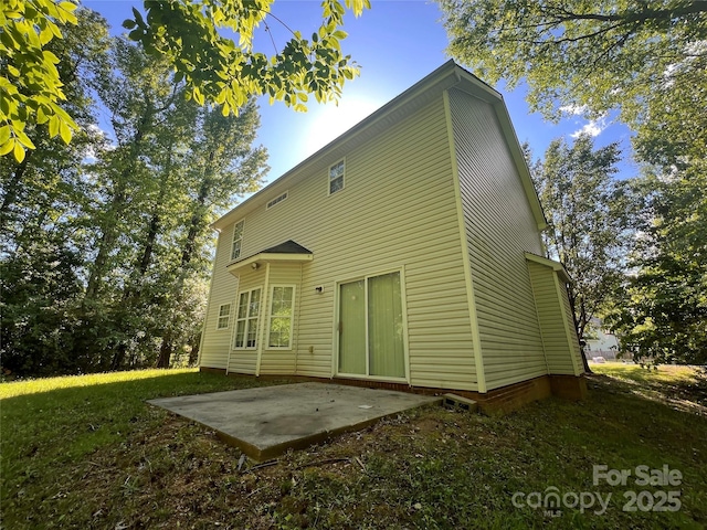 rear view of property with a patio
