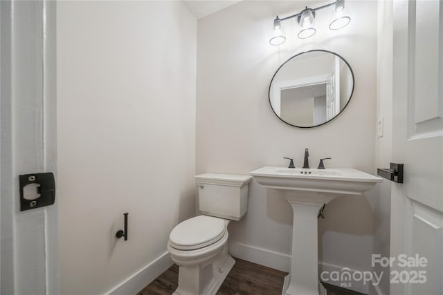 26056 Neptunes Lndg, Fort Mill, SC 29708 - bathroom featuring wood finished floors, toilet, and baseboards