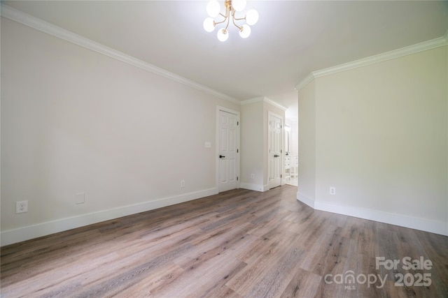 26056 Neptunes Lndg, Fort Mill, SC 29708 - unfurnished room featuring a chandelier, wood finished floors, baseboards, and ornamental molding