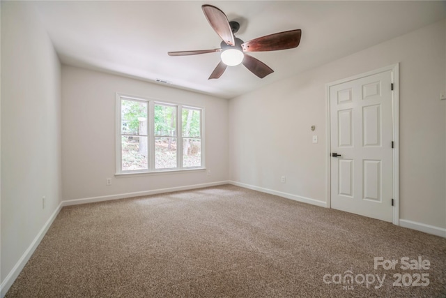 26056 Neptunes Lndg, Fort Mill, SC 29708 - spare room with carpet, ceiling fan, and baseboards