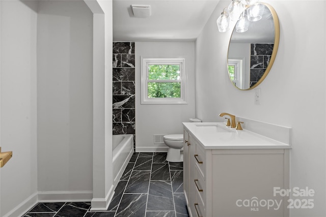 full bath with marble finish flooring, baseboards, and toilet