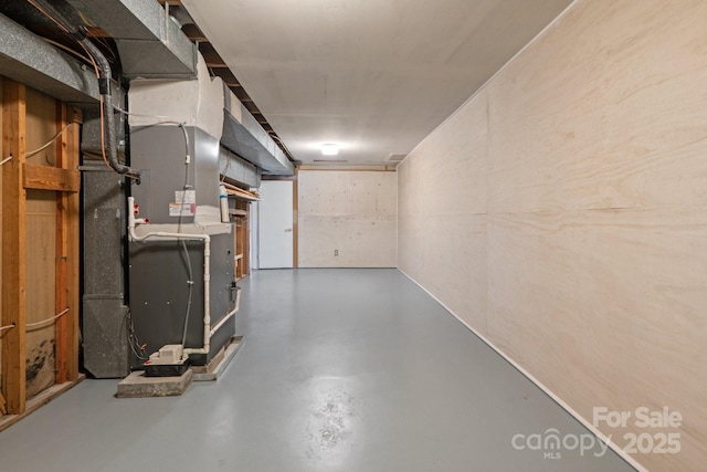unfinished basement with heating unit