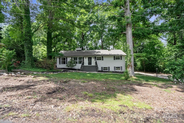 view of front of property with a chimney