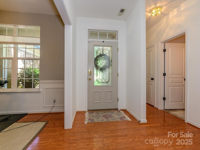 14336 Northridge Dr, Charlotte, NC 28269 - foyer featuring wood finished floors, healthy amount of natural light, and baseboards