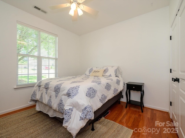 14336 Northridge Dr, Charlotte, NC 28269 - bedroom featuring light wood finished floors, a closet, baseboards, and ceiling fan