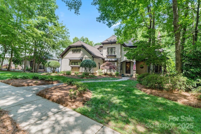 8534 Highgrove St, Charlotte, NC 28277 - english style home with stucco siding and a front yard