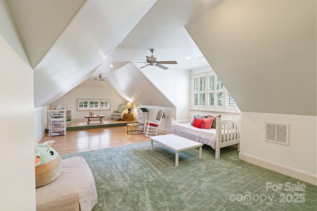 8534 Highgrove St, Charlotte, NC 28277 - living room featuring vaulted ceiling, ceiling fan, wood finished floors, baseboards, and recessed lighting