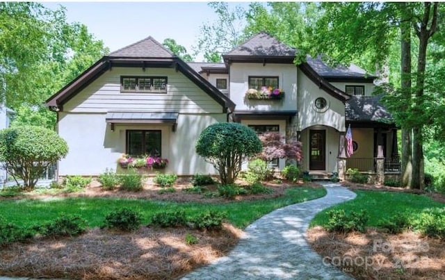 8534 Highgrove St, Charlotte, NC 28277 - tudor-style house featuring stucco siding