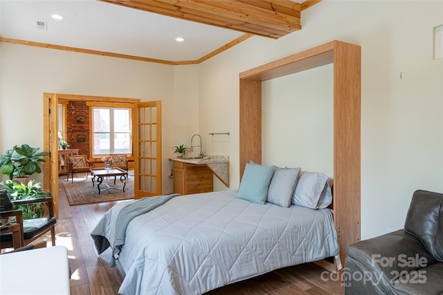 14 N Main St Unit 1 & 2, Waynesville, NC 28786 - bedroom featuring wood finished floors, recessed lighting, and crown molding