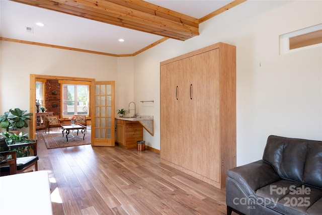 14 N Main St Unit 1 & 2, Waynesville, NC 28786 - living area with french doors, light wood-type flooring, recessed lighting, crown molding, and beamed ceiling