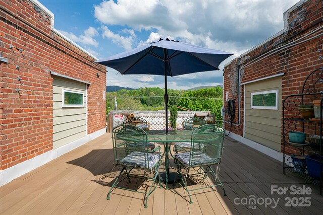 14 N Main St Unit 1 & 2, Waynesville, NC 28786 - wooden deck featuring outdoor dining space