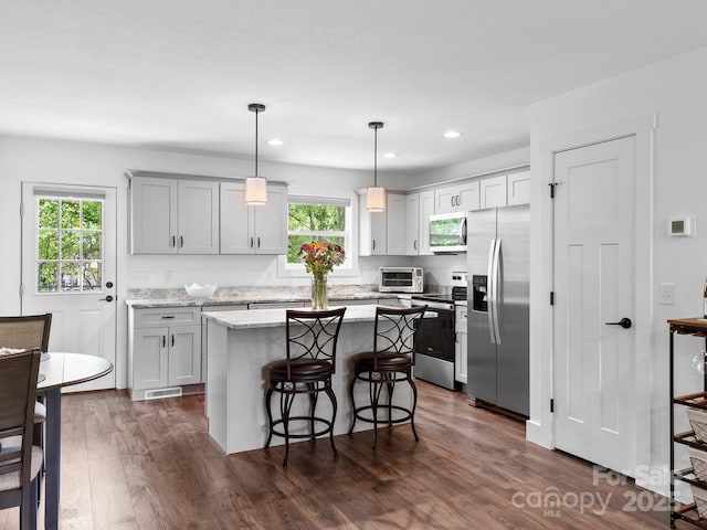 9 Ruff Rd, Leicester, NC 28748 - kitchen with appliances with stainless steel finishes, healthy amount of natural light, dark wood-style flooring, a center island, and recessed lighting