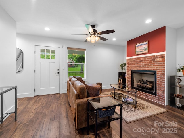 9 Ruff Rd, Leicester, NC 28748 - living room featuring ceiling fan, wood finished floors, a brick fireplace, recessed lighting, and baseboards