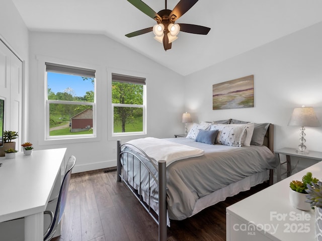 9 Ruff Rd, Leicester, NC 28748 - bedroom with lofted ceiling, dark wood-type flooring, baseboards, and ceiling fan