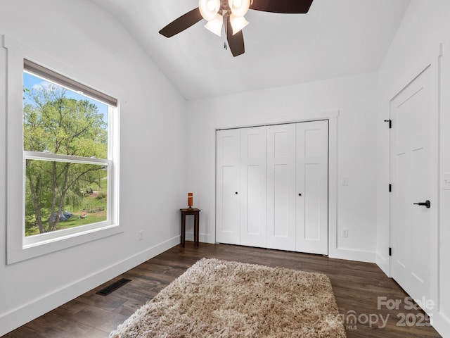 9 Ruff Rd, Leicester, NC 28748 - bedroom with vaulted ceiling, dark wood finished floors, a closet, a ceiling fan, and baseboards