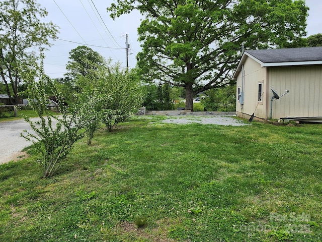 34 Edney Ln, Arden, NC 28704 - view of grassy yard featuring an outbuilding