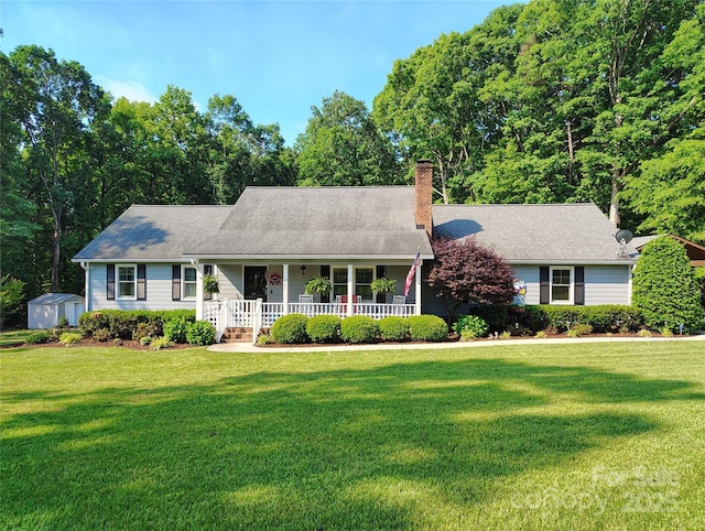 322 Killian Rd, Stanley, NC 28164 - view of front of property featuring covered porch, a front lawn, and a chimney