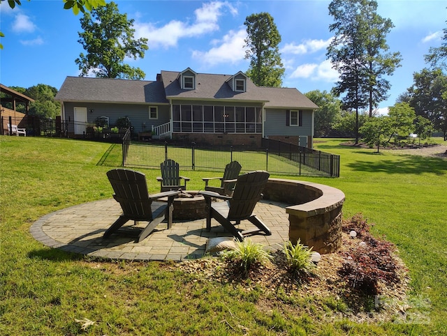 322 Killian Rd, Stanley, NC 28164 - back of property with a fire pit, a sunroom, and a patio