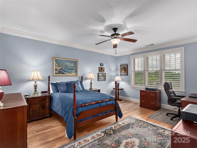 5 Holland Mountain Vw, Asheville, NC 28804 - bedroom with a desk, light wood-style flooring, ornamental molding, baseboards, and ceiling fan