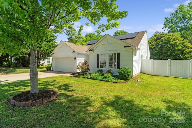 1961 Leesburg Dr, Clover, SC 29710 - view of front of home featuring an attached garage, solar panels, concrete driveway, a gate, and a shingled roof