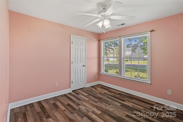 1961 Leesburg Dr, Clover, SC 29710 - unfurnished room with baseboards, dark wood-style flooring, and a ceiling fan