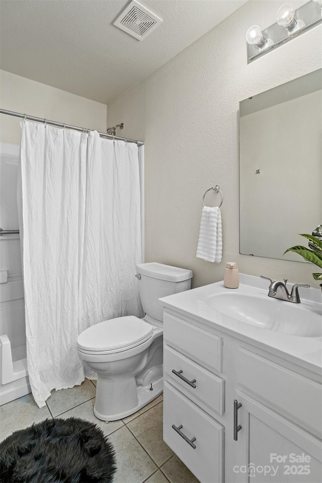 1961 Leesburg Dr, Clover, SC 29710 - bathroom with toilet, vanity, a shower with shower curtain, tile patterned flooring, and a textured ceiling