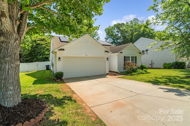 1961 Leesburg Dr, Clover, SC 29710 - view of front of property featuring driveway, a garage, solar panels, and a gate
