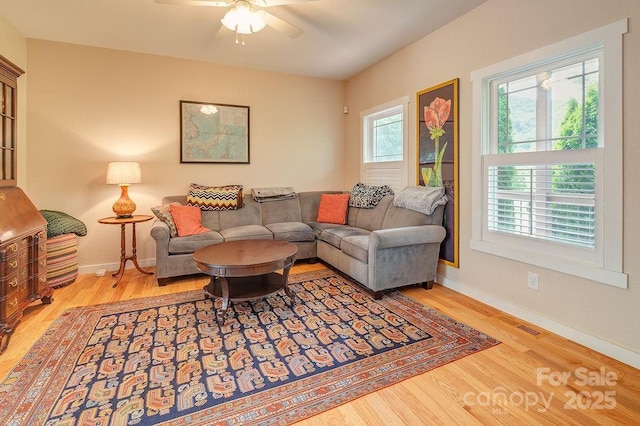 104 Bobby Ridge Dr, Leicester, NC 28748 - living area featuring wood finished floors, a ceiling fan, and baseboards
