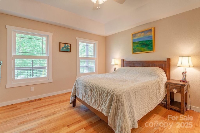 104 Bobby Ridge Dr, Leicester, NC 28748 - bedroom with wood finished floors, baseboards, and ceiling fan