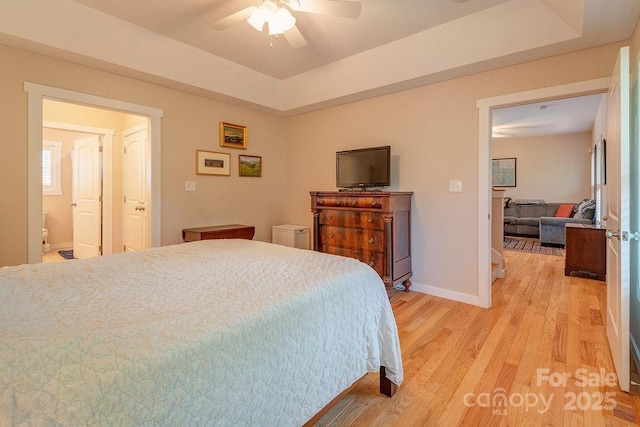 104 Bobby Ridge Dr, Leicester, NC 28748 - bedroom with light wood-type flooring, baseboards, and a ceiling fan