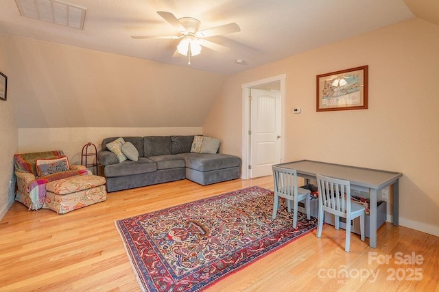 104 Bobby Ridge Dr, Leicester, NC 28748 - living area with vaulted ceiling, a ceiling fan, and wood finished floors