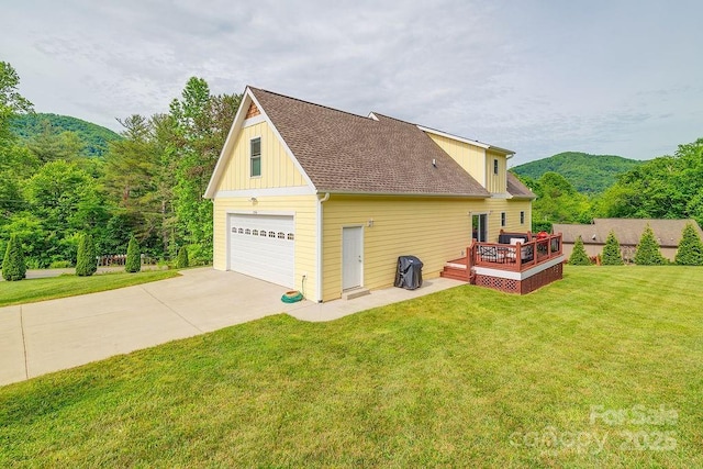 104 Bobby Ridge Dr, Leicester, NC 28748 - view of home's exterior featuring board and batten siding, a wooden deck, and a lawn