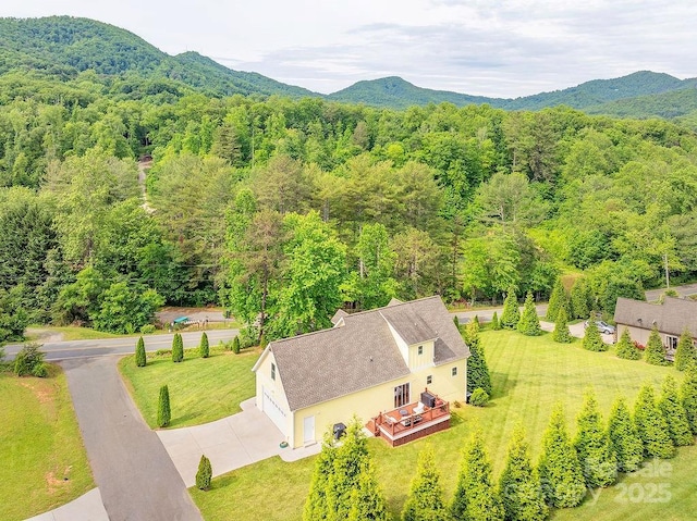 104 Bobby Ridge Dr, Leicester, NC 28748 - view of subject property featuring a heavily wooded area and a mountain backdrop