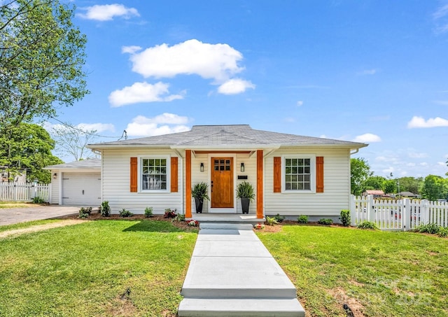 411 W Sycamore St, Lincolnton, NC 28092 - bungalow featuring driveway and an attached garage