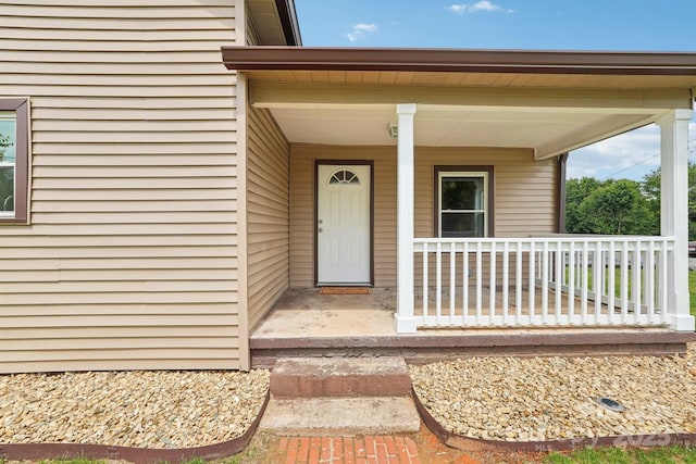 entrance to property with covered porch