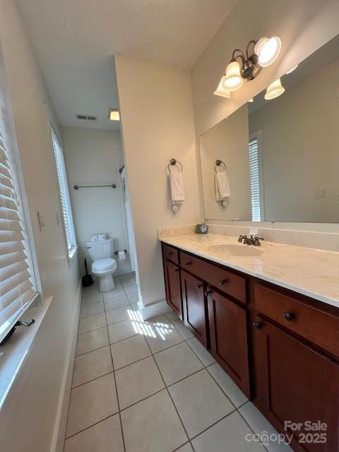 115 Breakaway Trl, Mars Hill, NC 28754 - bathroom with toilet, tile patterned flooring, vanity, and baseboards