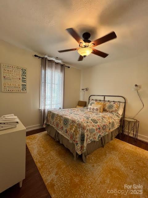 115 Breakaway Trl, Mars Hill, NC 28754 - bedroom with wood finished floors, baseboards, and a ceiling fan